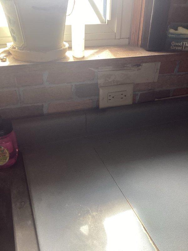 Responded to emergency electrical service call for two malfunctioned outlets with visible fire damage. Replaced burned receptacle that had sustained arcing damage from space heater overload, resulting in charred contacts and scorched wall surface. Installed GFCI outlet as replacement to provide enhanced ground fault protection. Replaced second damaged outlet in kitchen area with new receptacle. Verified proper circuit capacity, inspected wiring for heat damage, and confirmed all connections were secure and up to code. Tested both new outlets for proper operation and grounding.