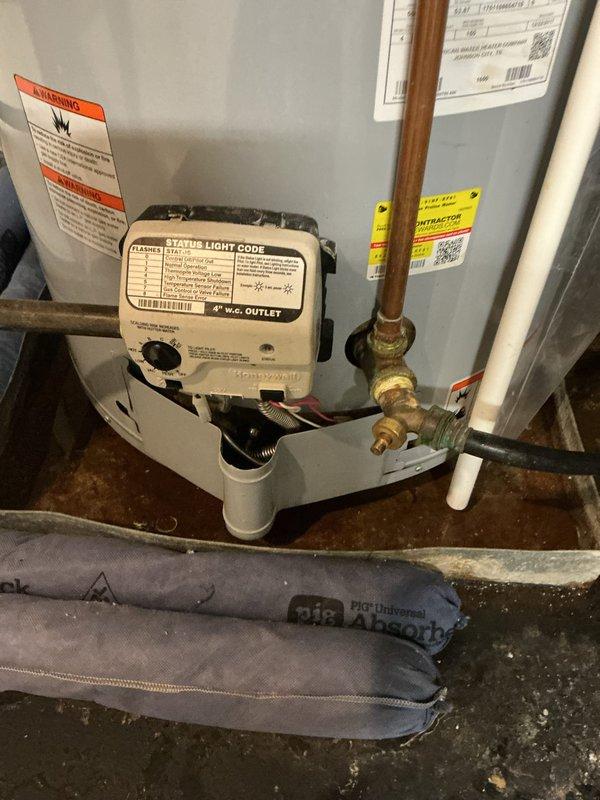 Conducted on-site assessment of 9-year-old 50-gallon residential water heater with 50,000 BTU input capacity requiring immediate replacement. Evaluated existing installation including all plumbing connections, copper supply lines, blue foam pipe insulation, drain pan, and gas line configuration in utility area. Provided competitive estimate for same-day water heater replacement with customer availability confirmed between 9:00 AM and 5:00 PM.