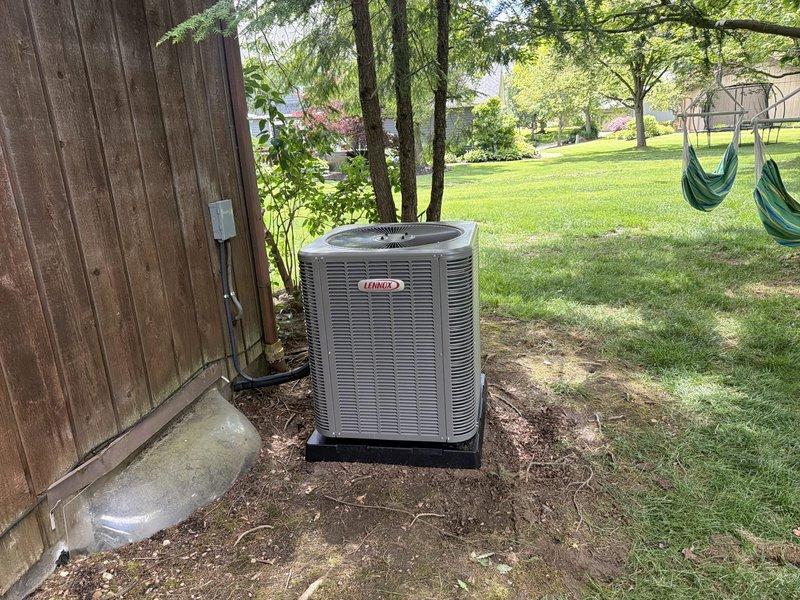 Completed full HVAC system installation including 80% efficiency furnace and air conditioning unit. Installed new Lennox outdoor condensing unit on pad with proper electrical disconnect and line set connections, ensuring all refrigerant lines and electrical components meet manufacturer specifications. Replaced dual 30-amp FLNR Littelfuse fuses in disconnect box to protect new equipment from electrical overload.