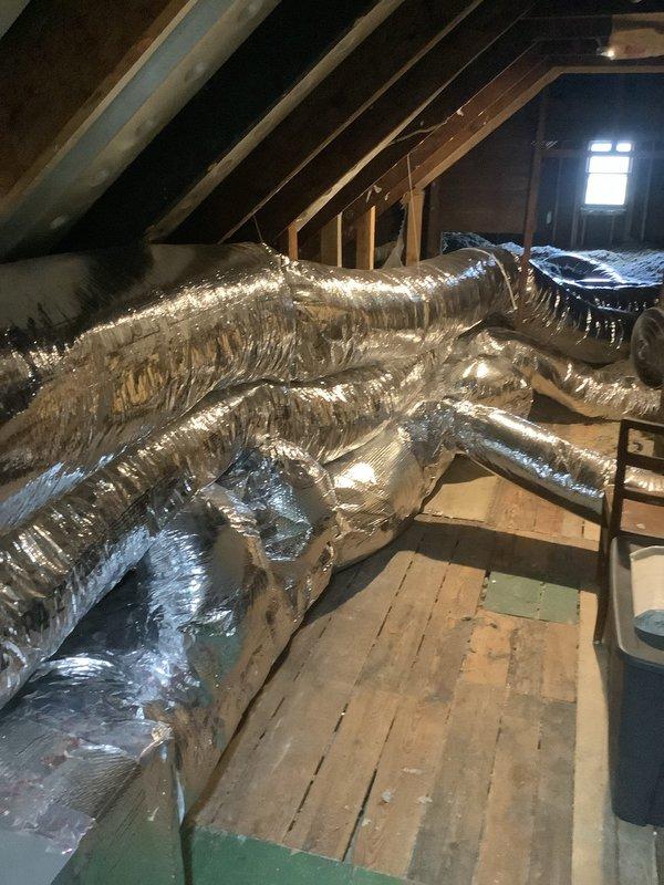 Performed system inspection per request to check refrigerant levels and airflow. Accessed attic-mounted air handler and inspected flexible ductwork throughout attic space. Verified duct integrity, proper insulation coverage, and adequate airflow distribution through supply runs. Confirmed refrigerant charge within manufacturer specifications and system operating normally with no deficiencies noted.