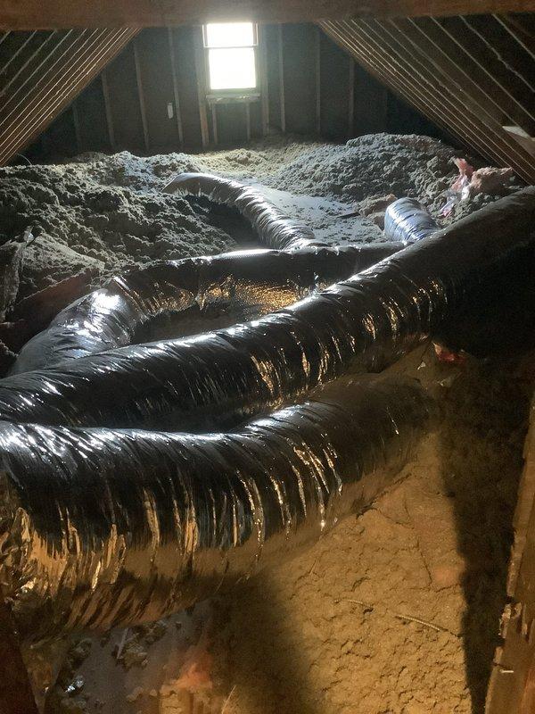 Performed system inspection per request to check refrigerant levels and airflow. Accessed attic-mounted air handler and inspected flexible ductwork throughout attic space. Verified duct integrity, proper insulation coverage, and adequate airflow distribution through supply runs. Confirmed refrigerant charge within manufacturer specifications and system operating normally with no deficiencies noted.