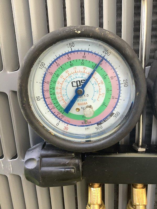 Responded to no air flow complaint on heat pump system. Upon arrival, performed diagnostic evaluation of outdoor unit. Checked refrigerant pressures using manifold gauge set and found system pressures within normal operating range for R410A refrigerant. Inspected control board and verified proper electrical connections and component operation with all indicator lights functioning correctly. Determined system did not require refrigerant charge or bi-flow filter replacement as initially suspected. Unit tested and confirmed operational.