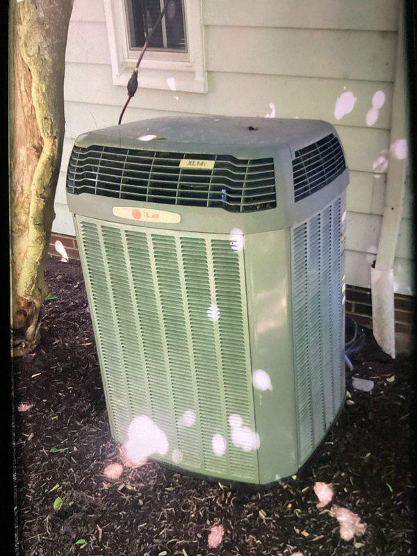 Completed preventive maintenance visit on 18-year-old residential air conditioning system for MVP customer. Inspected electrical components including MARS capacitor, contactor relay, and hard start assembly, verifying all connections were secure. Removed accumulated debris, leaves, and organic material from base of electrical compartment and exterior condenser unit to prevent airflow restriction and potential component damage.