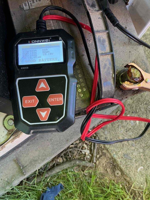 Performed scheduled maintenance on a 16kW standby generator unit, approximately 9 years old. Conducted comprehensive system inspection including visual examination of exterior housing, ventilation louvers, and control panel functionality. Verified proper operation of status indicator lights and checked all electrical connections and conduit for secure mounting and weather integrity.

Performed battery load test using diagnostic equipment, measuring cold cranking amps (CCA) and voltage levels to assess battery health and starting capacity. Inspected battery terminals for corrosion and verified proper cable connections. Evaluated concrete pad stability and drainage around unit perimeter. Confirmed generator positioning and clearances meet manufacturer specifications. All systems tested and found operational within normal parameters.
