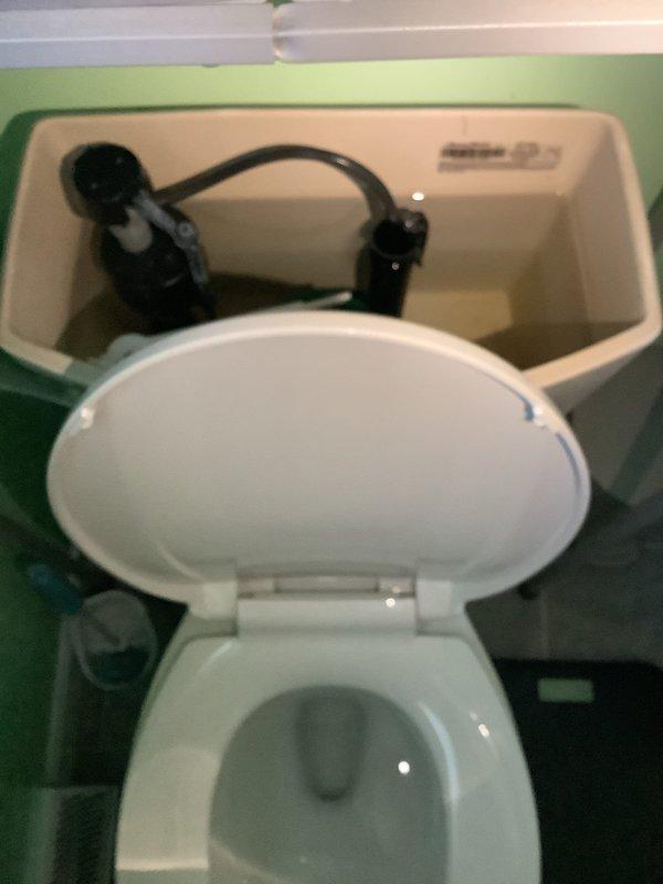Completed comprehensive plumbing inspection of residential property at 8am, examining supply lines and fixtures throughout the home. Inspected crawl space plumbing infrastructure, including copper supply lines with shutoff valve assembly and T-joint connections serving upper fixtures, confirming proper installation and functionality. Examined bathroom toilet installation, fill valve mechanism, and flush valve assembly to verify proper operation and identify any potential maintenance needs.