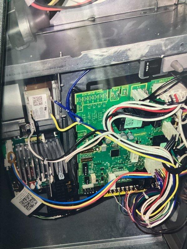 Responded to no-cooling call where A/C unit experienced electrical short and failed to restart. Upon arrival, inspected outdoor condenser unit and accessed control board compartment. Found damaged control board with visible signs of electrical failure. Replaced defective circuit board, verified all wire connections, and tested system operation. Unit restored to normal cooling operation with all safety controls functioning properly.