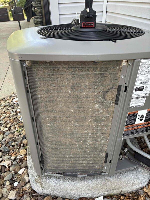 Completed scheduled MVP cooling maintenance visit on 6-year-old system. Upon arrival, performed comprehensive system inspection and diagnostics. Found outdoor condenser coil heavily clogged with dirt, dust, and debris accumulation. Cleaned condenser coil thoroughly to restore proper airflow and heat transfer efficiency. Conducted electrical testing using clamp meter, recording system temperature at 242°F and verifying electrical parameters within normal operating range. Took diagnostic measurements to confirm system performance. Unit operational and cooling properly upon completion of maintenance service.