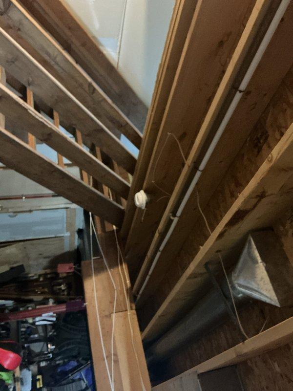 Completed in-house warranty repair on sump pump discharge system. Installed plug into existing PVC pipe at current discharge point. Replaced and relocated discharge tubing to sump pump, upgrading line size from existing configuration to 3/4" poly pipe for improved drainage capacity and system performance.