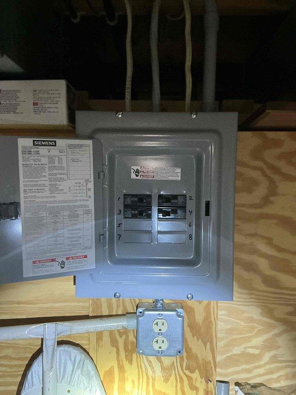 Conducted electrical estimate for standby generator installation at residential property. Assessed exterior mounting location adjacent to home with consideration for existing landscaping, brick paver walkway, and utility connections. Evaluated interior electrical infrastructure including existing subpanel with available circuit breaker capacity and weatherproof receptacle installation in utility space. Documented site conditions and electrical service requirements for generator integration with home's electrical system.