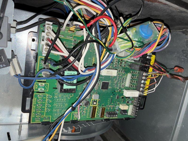 Completed MVP recurring cooling maintenance visit on 8-year-old system. Performed comprehensive inspection of control board assembly, verifying all electrical connections, wire harnesses, and circuit board components for proper operation. All electronic components, capacitors, and connection points found secure with no signs of failure or deterioration.