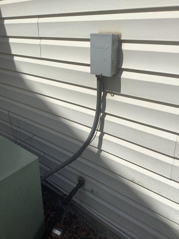 Responded to no cooling complaint on 17-year-old residential air conditioning system. Upon inspection, identified refrigerant leak in outdoor condenser unit. Unit showed significant age-related deterioration with weathered cabinet and components. Provided comprehensive replacement estimate ranging from basic to premium equipment options to address failed system. Documented existing equipment configuration including outdoor condenser unit on concrete pad with gravel base, electrical disconnect box, and refrigerant line routing along exterior wall. Customer quoted for complete system replacement due to age of equipment and extent of refrigerant leak making repair cost-prohibitive.
