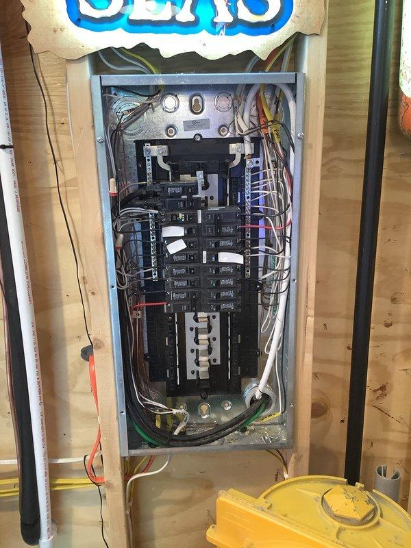 Installed two dedicated 20-amp circuits for air conditioning equipment, running new wiring from the main electrical panel to the outdoor condenser unit. Terminated all conductors at the panel with appropriate circuit breakers, installed exterior disconnect junction box with conduit connections, and routed electrical lines through composite decking area to service the HVAC system. All wiring was completed using truck stock materials, with proper grounding and code-compliant installation methods throughout.
