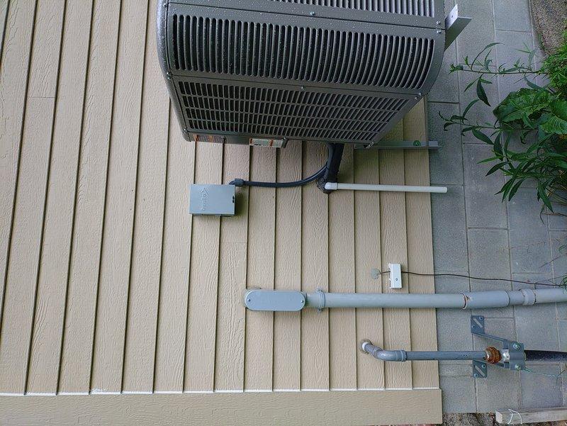 Installed two dedicated 20-amp circuits for air conditioning equipment, running new wiring from the main electrical panel to the outdoor condenser unit. Terminated all conductors at the panel with appropriate circuit breakers, installed exterior disconnect junction box with conduit connections, and routed electrical lines through composite decking area to service the HVAC system. All wiring was completed using truck stock materials, with proper grounding and code-compliant installation methods throughout.