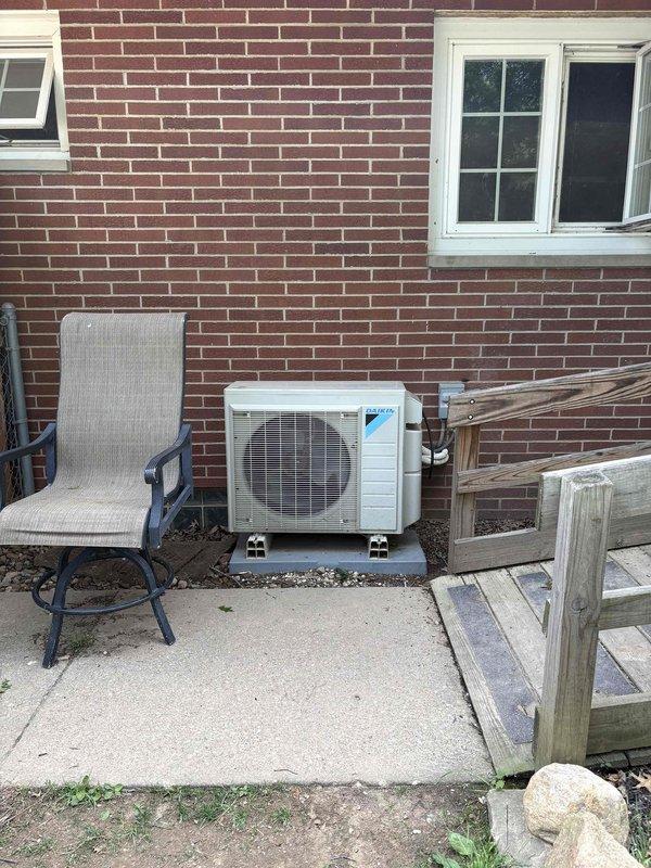 Completed estimate for mini-split system installation at residential property. Assessed existing Daikin outdoor condenser unit and electrical panel configuration, documented current setup with photographs for quote preparation. Customer to confirm disconnect requirements before proceeding with installation.