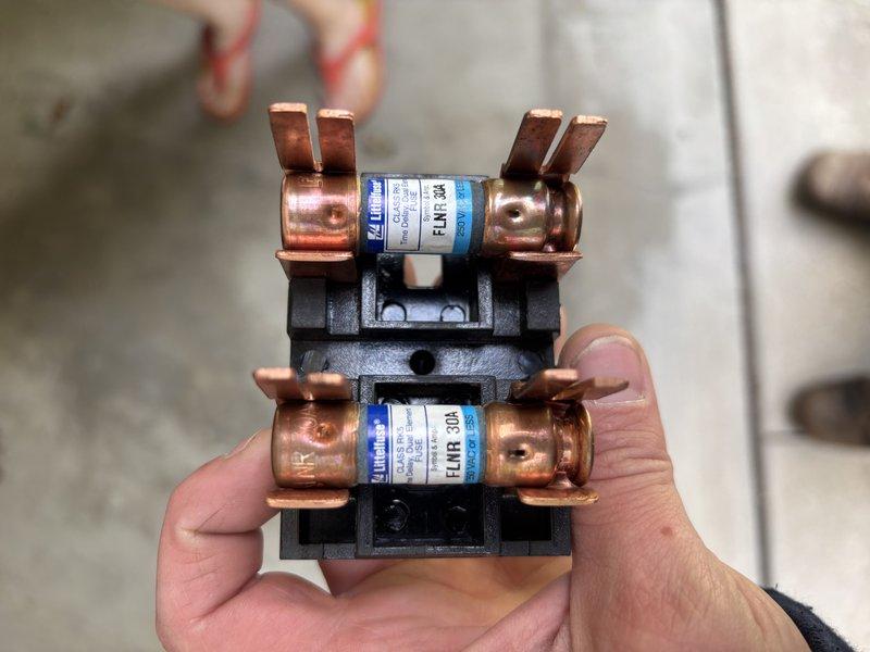Completed MVP cooling maintenance visit with access through rear entrance as requested. Performed inspection of evaporator coil assembly, verifying proper condition of serpentine aluminum/copper tubing and foil wrapping integrity. Inspected and tested 30-amp FLNR fuses in electrical disconnect, confirming proper amperage rating and secure mounting in fuse block assembly.