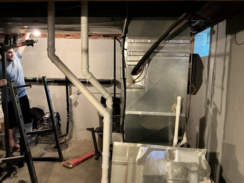 Performed comprehensive assessment of residential HVAC system experiencing no cooling condition. Evaluated existing furnace and air conditioning equipment located in basement utility area, documented current system configuration including ductwork, electrical connections, and condensate drainage system. Provided detailed replacement estimate for complete HVAC system upgrade to restore cooling functionality.