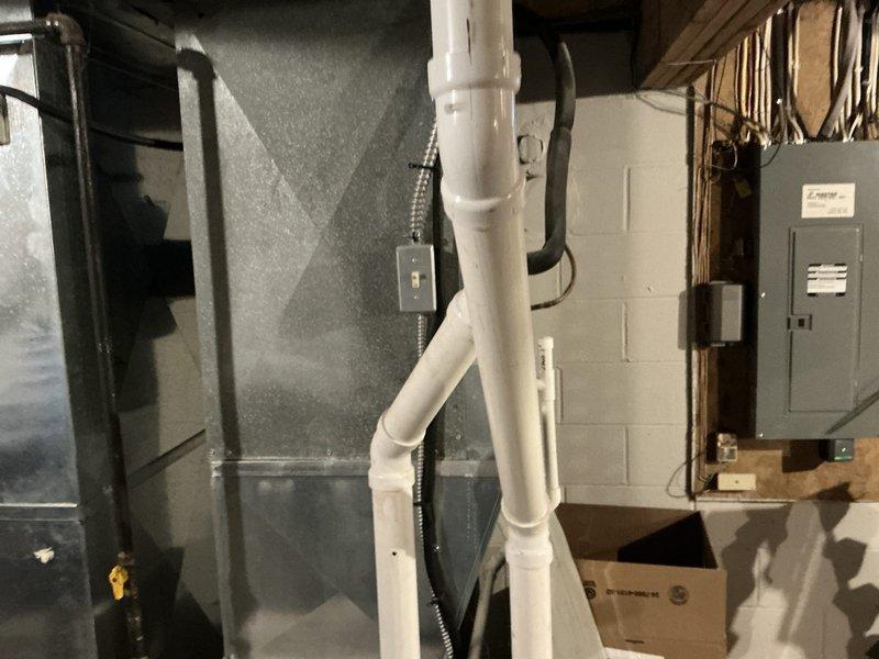 Performed comprehensive assessment of residential HVAC system experiencing no cooling condition. Evaluated existing furnace and air conditioning equipment located in basement utility area, documented current system configuration including ductwork, electrical connections, and condensate drainage system. Provided detailed replacement estimate for complete HVAC system upgrade to restore cooling functionality.
