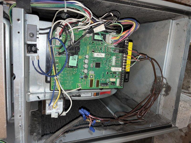 Responded to service call for water leakage in basement from HVAC unit. Inspected control panel and PCB assembly, verifying all electrical connections and wire harnesses were properly secured to circuit board and terminal blocks. Checked and replaced dirty 16x25x1 air filter which showed significant dust and debris accumulation that could restrict airflow and contribute to condensate drainage issues. System inspected and operational following service.