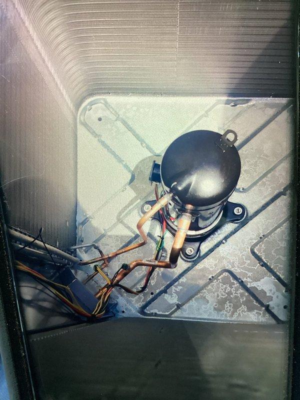 Responded to service call for newly installed A/C unit reported to be excessively loud with unusual noises. Performed diagnostic inspection of system components including compressor, capacitor, and electrical connections. Verified unit is operating within normal parameters and cooling effectively. Inspected compressor mounting, refrigerant lines, and electrical wiring for any loose connections or installation issues. Documented system condition with photos showing properly installed capacitor, secure electrical connections, and compressor assembly. Advised customer that operational sounds are consistent with normal system operation and not related to installation defect or warranty claim.