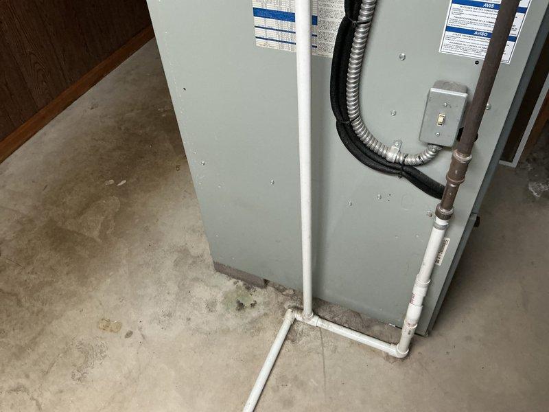 Provided estimate for complete HVAC system replacement on a 21-year-old unit experiencing no cooling condition. The existing outdoor condenser unit showed significant leaf debris accumulation on and around the equipment, and the indoor air handler components displayed age-related wear consistent with the system's service life, necessitating full system replacement rather than repair.