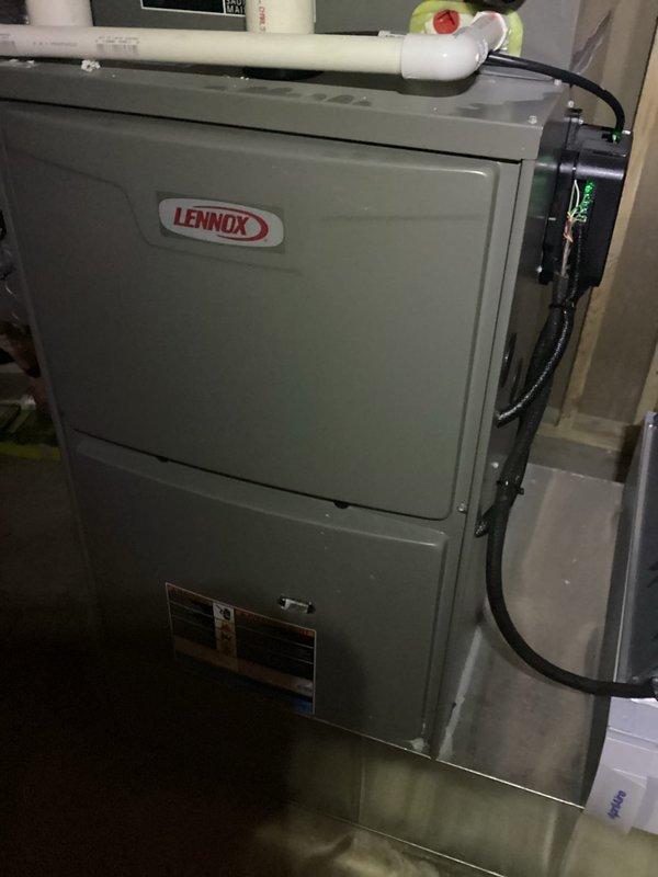 Responded to warranty call for loud banging noise from Lennox AC unit installed one year ago. Upon inspection, accessed internal electrical components and identified issue with transformer/relay assembly. Documented equipment condition and electrical connections including multiple wire terminations. Unit evaluated and serviced to resolve noise concern under manufacturer warranty coverage.