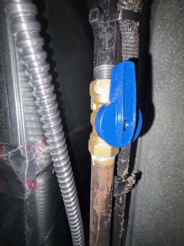 Completed full HVAC system installation including 80% efficiency furnace and air conditioning unit. Installed new air handler in utility space with proper plenum connections and insulated ductwork, along with condensate drainage system using PVC piping. Added blue ball valve to existing copper water line for system integration and future serviceability.