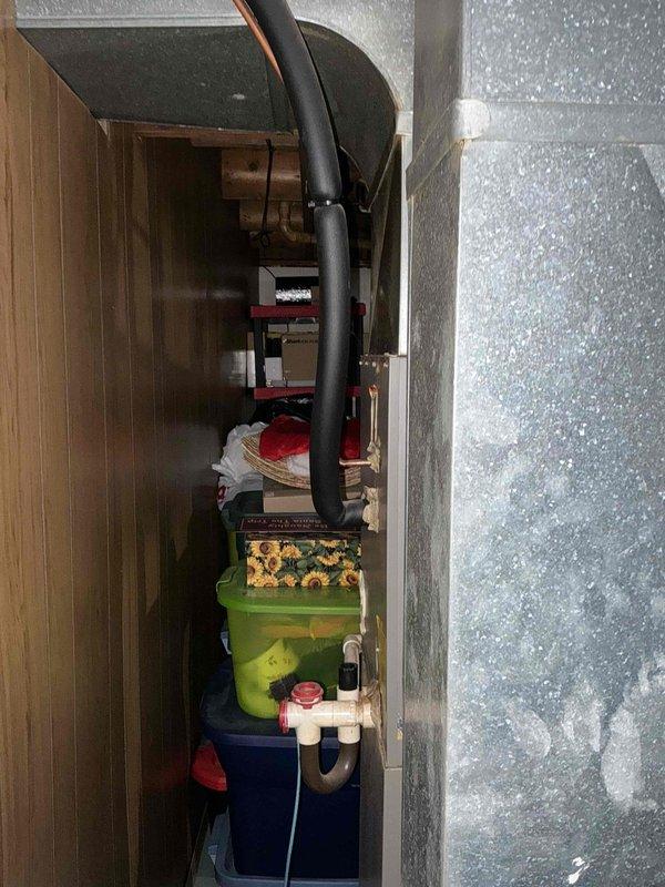 Completed comprehensive HVAC system assessment for equipment replacement estimate in basement mechanical room. Documented existing gray metal furnace/air handler unit, associated ductwork, PVC drainage lines, copper gas line, and electrical connections to provide accurate replacement specifications and installation requirements.