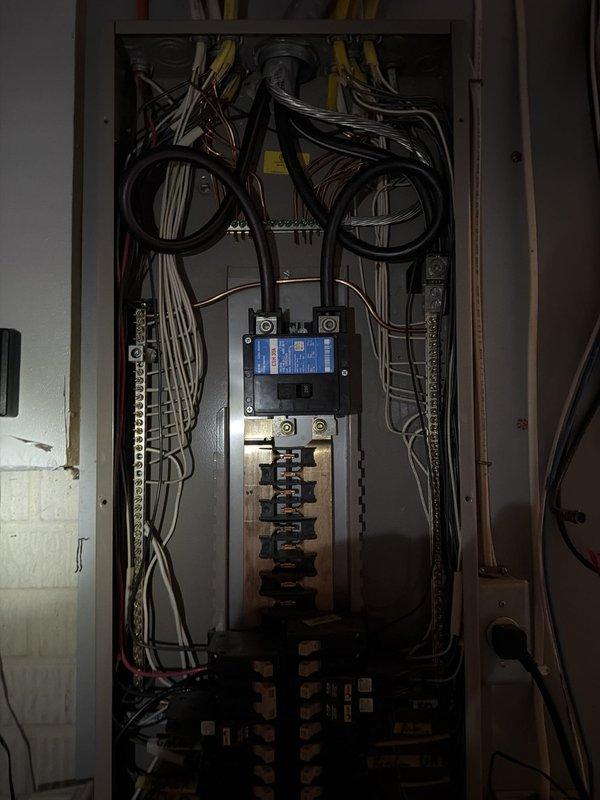 Completed installation of 18kW Generac whole home generator system with 200-amp automatic transfer switch. Ran 60 feet of electrical supply line from main service panel to transfer switch location and 30 feet of natural gas supply line to generator unit. Installed transfer switch in utility area with proper grounding and bonding, wired all necessary circuits for whole home backup coverage, and mounted Generac control module. Terminated all power conductors at transfer switch, verified proper phasing, and completed all electrical connections per manufacturer specifications and local code requirements. System tested and operational, ready for automatic transfer during power outages.