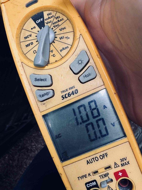 Completed MVP recurring cooling maintenance visit. Performed electrical diagnostics using digital multimeter, measuring amperage draw at 10.8A and secondary reading of 8.0A to verify proper system operation. Inspected control board components including resistors, capacitors, and DIP switch configuration settings for proper function and connections.