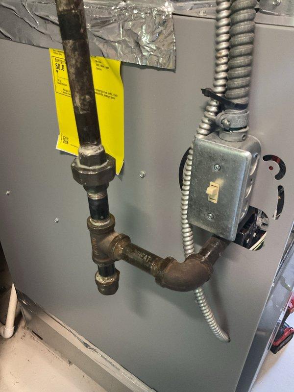 Responded to emergency natural gas leak at furnace system for property in pre-sale inspection. Upon arrival, performed comprehensive leak detection testing on gas supply line and furnace connections. Identified active leak at threaded pipe fitting connection upstream of furnace gas valve. Shut down gas supply and tagged system per safety protocols. Disassembled compromised fitting, inspected threaded connections for corrosion and wear, and cleaned all mating surfaces. Applied new pipe thread sealant and reassembled connection with proper torque specifications. Restored gas service and conducted pressure testing at 120 SCF to verify system integrity. Performed soap bubble test on all joints and connections to confirm leak elimination. Verified proper furnace operation and gas valve function. System restored to safe operating condition and cleared for continued use.