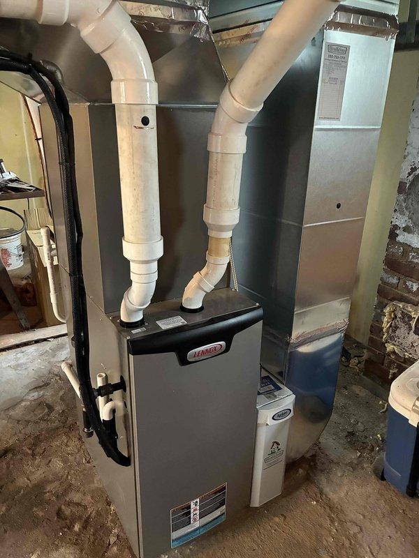 Completed scheduled preventive maintenance cooling visit on 3-year-old residential HVAC system. Performed comprehensive inspection of indoor Lennox furnace and Carrier air handler unit located in basement, verifying proper operation of all components, condensate drain lines, and PVC piping connections. Proceeded to outdoor condenser unit where standard maintenance protocol was executed, including cleaning of mesh filter panels, inspection of fan assembly, verification of electrical connections, and assessment of refrigerant system performance. All equipment found operating within manufacturer specifications with no deficiencies noted. System confirmed ready for continued cooling season operation.