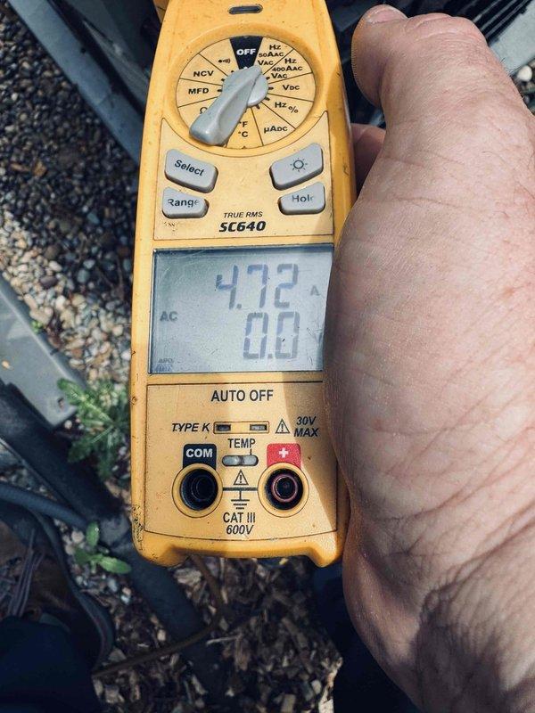 Replaced failed compressor under parts warranty on residential HVAC system. Upon completion, verified proper amperage draw and system operation using clamp meter, confirming compressor running at 4.72 amps initially and 0.55 amps during steady-state operation, indicating successful installation and normal electrical performance.