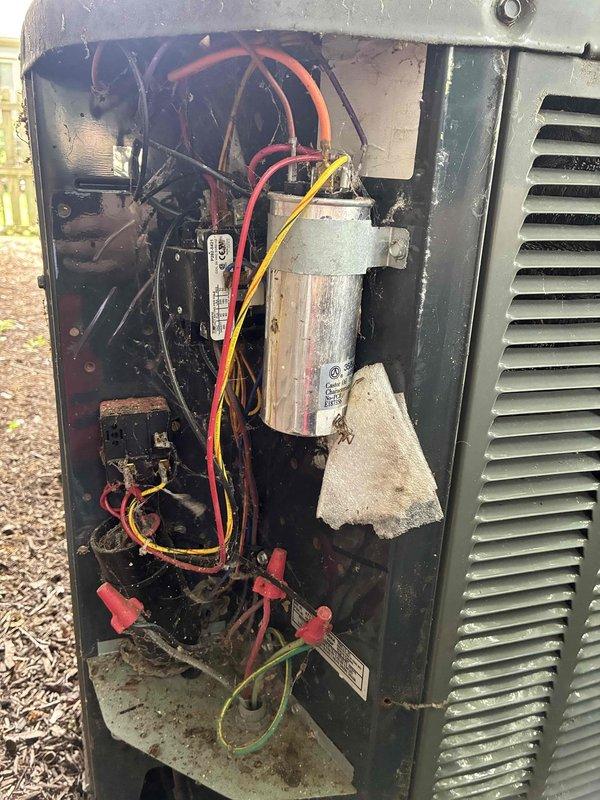 Completed routine cooling maintenance on a 14-year-old Trane air conditioning system as part of the MVP recurring service plan. Performed comprehensive inspection of outdoor condenser unit, verified proper operation of capacitor and electrical components, and documented system condition with interior and exterior photographs showing normal wear consistent with unit age.