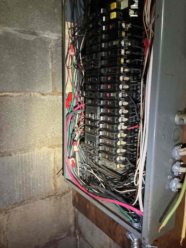 Performed on-site evaluation for Kohler liquid-cooled generator installation. Assessed existing electrical panel configuration and available utility room space to determine feasibility and requirements for generator system integration. Documented current electrical infrastructure including main service panel and basement mechanical room layout to provide accurate installation estimate.