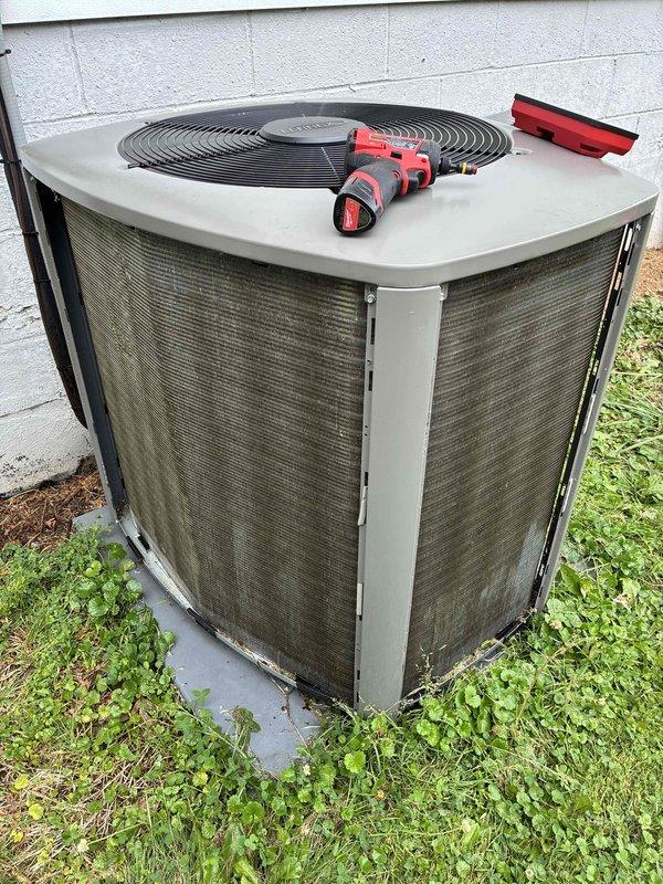 Performed comprehensive cooling maintenance on 2-year-old air conditioning system. Completed full system inspection of outdoor condenser unit, including cleaning of coils and protective grilles, verification of proper airflow through louvered panels, and inspection of fan assembly. All components were found to be operating within normal parameters, with unit showing good overall condition for its age.