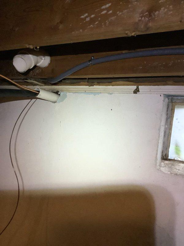 Relocated furnace circuit and installed new 40-amp dedicated circuit for outdoor air conditioning condenser unit. Ran electrical conduit from interior panel through basement joists to exterior disconnect box mounted on building siding, utilizing existing wire pathway where possible to minimize material usage. Installed weatherproof disconnect switch at exterior unit location and verified proper amperage rating for AC compressor load requirements. All wiring installed per NEC standards with appropriate gauge conductors for circuit protection and equipment specifications.