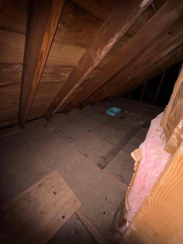 Conducted comprehensive HVAC system assessment for air conditioning replacement estimate. Evaluated existing OXBOX furnace installation in basement utility area, documenting current ductwork configuration and measuring equipment dimensions for compatibility planning. Inspected attic space to assess accessibility and structural considerations for potential air handler or evaporator coil placement, noting existing insulation conditions and available working area for new equipment installation.