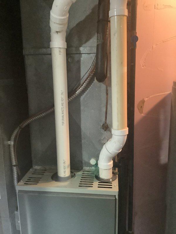 Provided comprehensive estimate for complete furnace and air conditioning system replacement at residential property. Evaluated existing American Standard furnace installation in basement utility area, assessed current PVC venting configuration, and documented existing equipment specifications to determine appropriate replacement options for both heating and cooling systems.