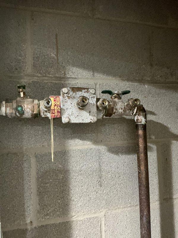 Completed annual backflow preventer testing on a 1" Watts 007 series device. Performed standard test procedures on both check valves, recording differential pressure readings of 3.6 PSI on each valve. All components passed inspection criteria. Documented device serial number, verified proper operation of relief valve, and completed required certification paperwork for regulatory compliance.