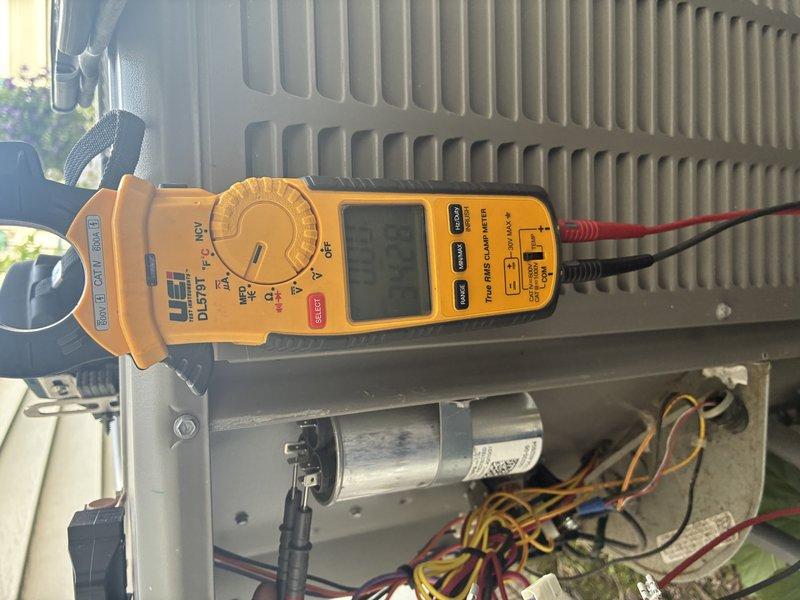 Completed scheduled air conditioner maintenance on a 9-year-old cooling system. Performed comprehensive tune-up including electrical diagnostics using clamp meter to verify amperage draw and system performance, inspected condenser coil fins, tested capacitor operation and electrical connections, and evaluated overall unit functionality. All components found operating within normal parameters; system running efficiently with no issues identified.