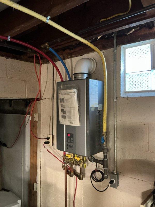 Responded to morning service request for leaking toilet replacement. Removed existing standard-height toilet and installed new comfort-height model to address both the leak issue and customer's accessibility preference. Connected water supply line to chrome shut-off valve with braided metal supply hose. Ensured proper seal at floor flange and verified all connections were leak-free upon testing. Existing gray wood-look vinyl plank flooring and white baseboard trim remained undisturbed during installation.