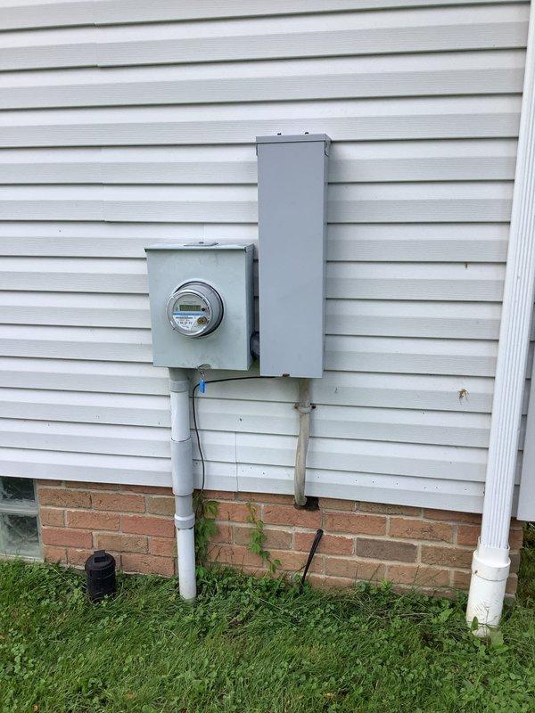 Responded to service call for electrical panel malfunction following lightning strike. Upon arrival, performed comprehensive diagnostic evaluation of main distribution panel and exterior meter assembly. Inspection revealed compromised circuit breakers and potential surge damage to panel components. Documented existing conditions including mixed breaker configuration with standard single-pole and double-pole breakers, junction connections at panel base, and exterior meter housing with associated disconnect box. Assessed wiring integrity throughout panel including all branch circuit conductors entering from top and bottom of enclosure. Identified multiple circuits requiring attention due to lightning-related electrical surge. Provided diagnostic findings and repair recommendations to customer for proper restoration of electrical system functionality and safety compliance.