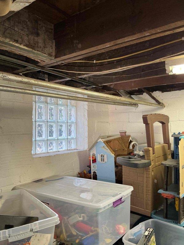 Conducted on-site electrical assessment for standby generator installation in residential basement. Evaluated existing electrical infrastructure, available space for equipment placement, and optimal routing for electrical connections and fuel lines. Documented site conditions including ceiling clearances, access points, and proximity to existing electrical panel for transfer switch installation.