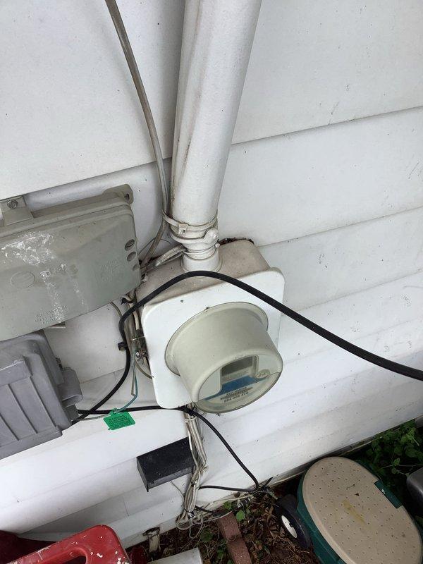 Responded to service call for damaged electrical service entrance following tree branch contact with overhead power line. Upon arrival, assessed exterior electrical components including weatherhead, service mast, and meter base assembly. Documented existing conditions showing compromised service entrance conductors running along building exterior with inadequate clearance and structural support concerns. Service mast penetration through roof exhibited weathering and potential compromise to flashing integrity. Electrical utility company had disconnected power and required complete repair and rewiring before reconnection. Provided comprehensive estimate for replacement of damaged service entrance components, including new weatherhead, service mast assembly, entrance conductors, and associated hardware to meet current NEC requirements and utility specifications for proper clearances and secure mounting.