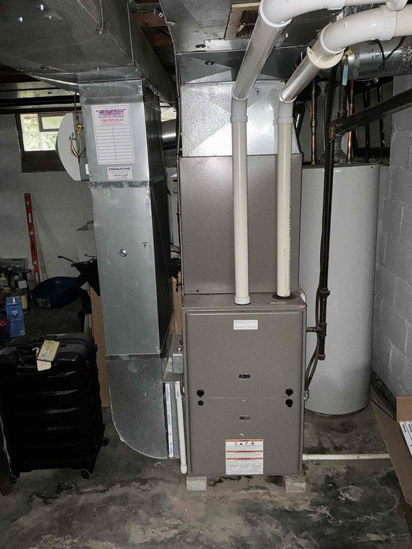 Conducted comprehensive assessment of existing HVAC system in basement mechanical room for equipment replacement estimate. Documented current furnace, air handler, and ductwork configuration including metal supply plenum connections and distribution layout. Photographed equipment specifications, clearances, and existing infrastructure to provide accurate replacement proposal for aging heating and cooling system.