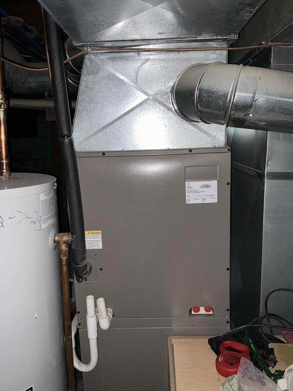 Conducted comprehensive assessment of existing HVAC system in basement mechanical room for equipment replacement estimate. Documented current furnace, air handler, and ductwork configuration including metal supply plenum connections and distribution layout. Photographed equipment specifications, clearances, and existing infrastructure to provide accurate replacement proposal for aging heating and cooling system.