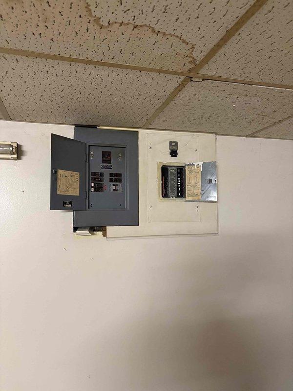 Conducted on-site evaluation for mini-split system installation and electrical panel upgrade. Assessed existing dual-meter electrical infrastructure and aging secondary breaker panel to determine capacity and compatibility requirements for new ductless heat pump system. Documented current electrical service configuration, including conduit routing and available breaker positions, to develop comprehensive installation proposal and ensure proper load calculations for the planned HVAC equipment addition.