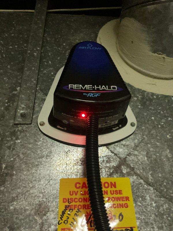Completed MVP recurring cooling maintenance visit. Inspected and verified REME-HALO air purification system operational with UV light indicator illuminated and properly mounted in ductwork. Checked evaporative cooler pad showing normal wear with minimal dust accumulation and adequate airflow through mesh filter media.