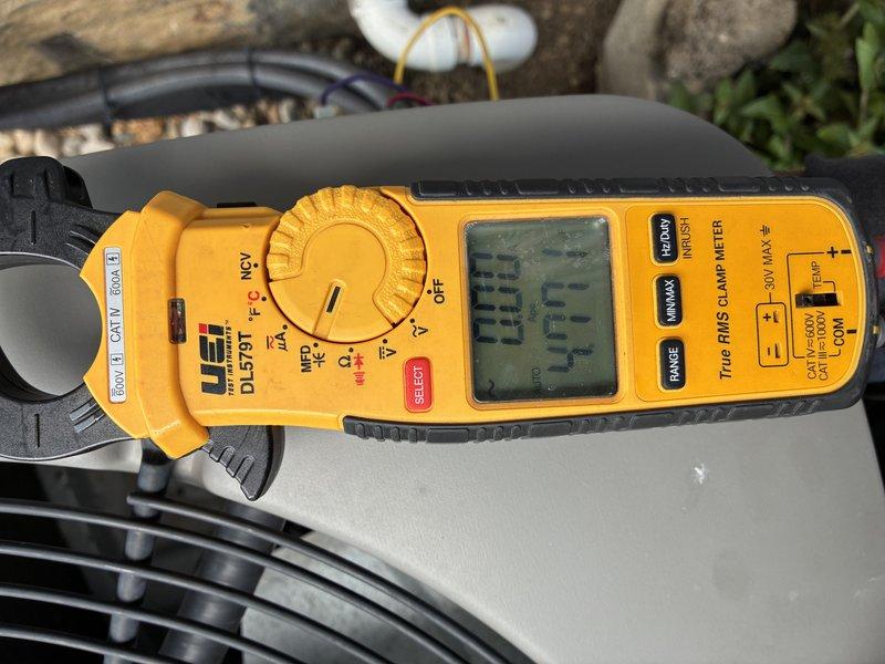 Completed MVP Cooling Visit maintenance service on residential air conditioning system. Performed electrical diagnostics and measurements using digital clamp meter to verify proper amperage draw and system performance. All tested parameters within normal operating specifications, unit operating efficiently.