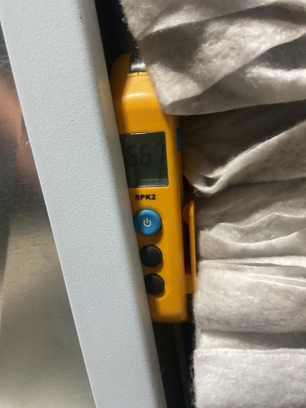 Responded to high indoor humidity reading of 70% reported by thermostat. Upon inspection, found outdoor condenser unit heavily contaminated with dirt, dust, and debris accumulation on exterior casing and coil surfaces, significantly restricting airflow and reducing system efficiency. Used diagnostic equipment to assess system performance and confirmed compromised heat exchange capability due to blocked condenser coils affecting overall cooling and dehumidification capacity.